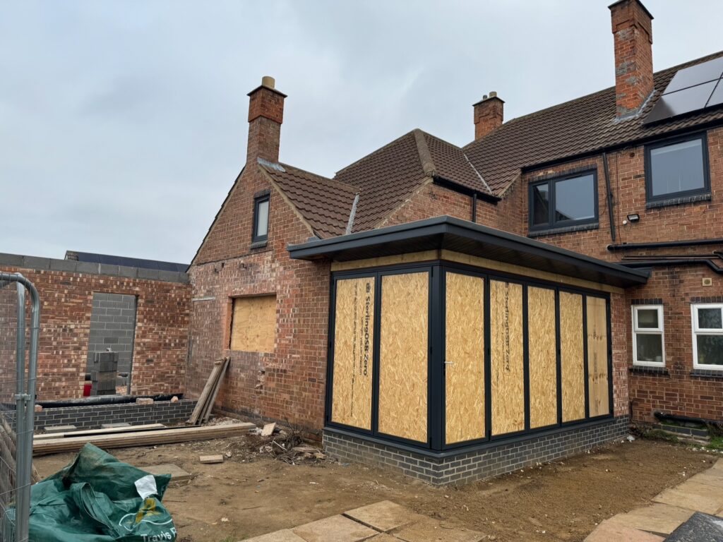 House extension under construction with new brickwork by Baker Builds